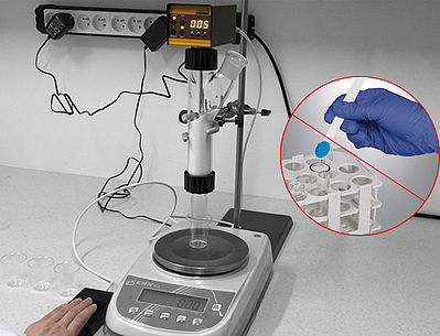 Automated powder dosing in the lab with DOSER and foot-switch